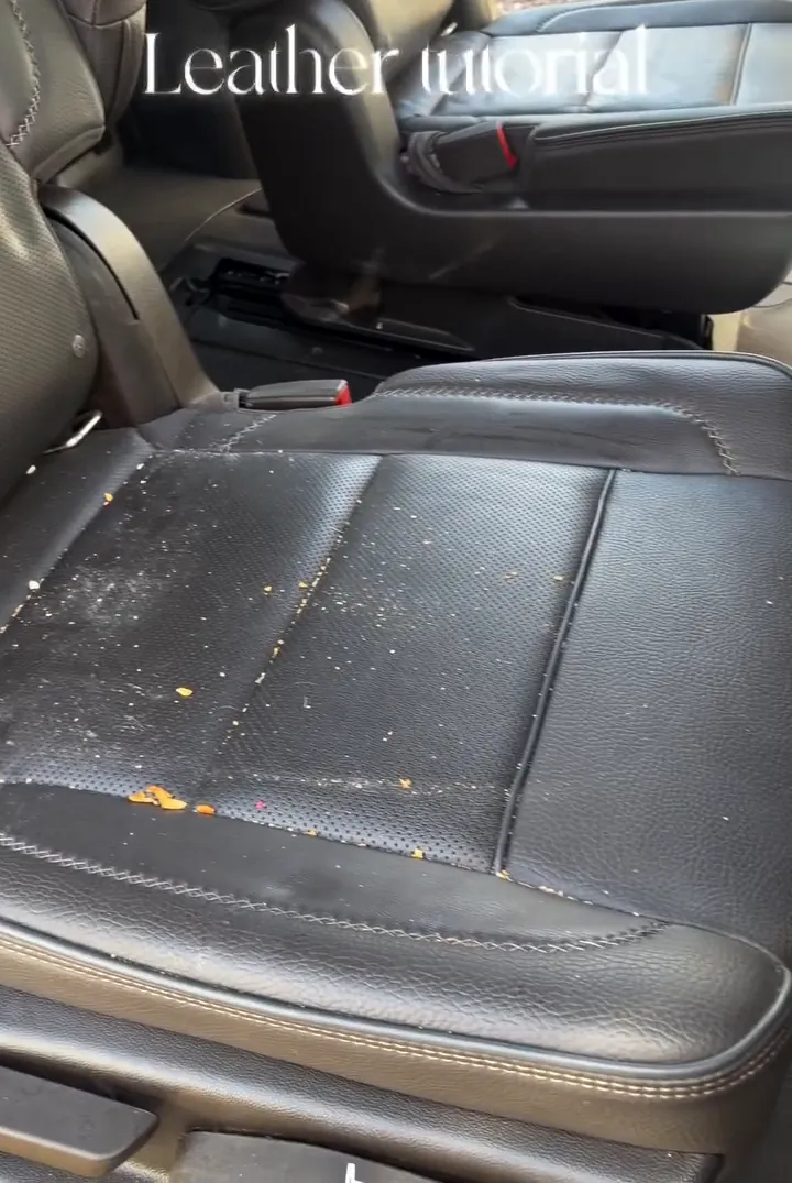 Vacuuming the creases of a leather seat